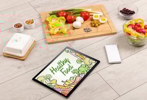 Wooden Board with selection of healthy foods and Healthy Food sign