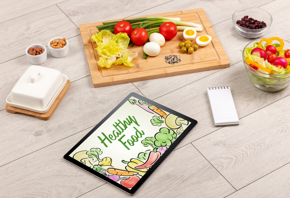 Wooden Board with selection of healthy foods and Healthy Food sign